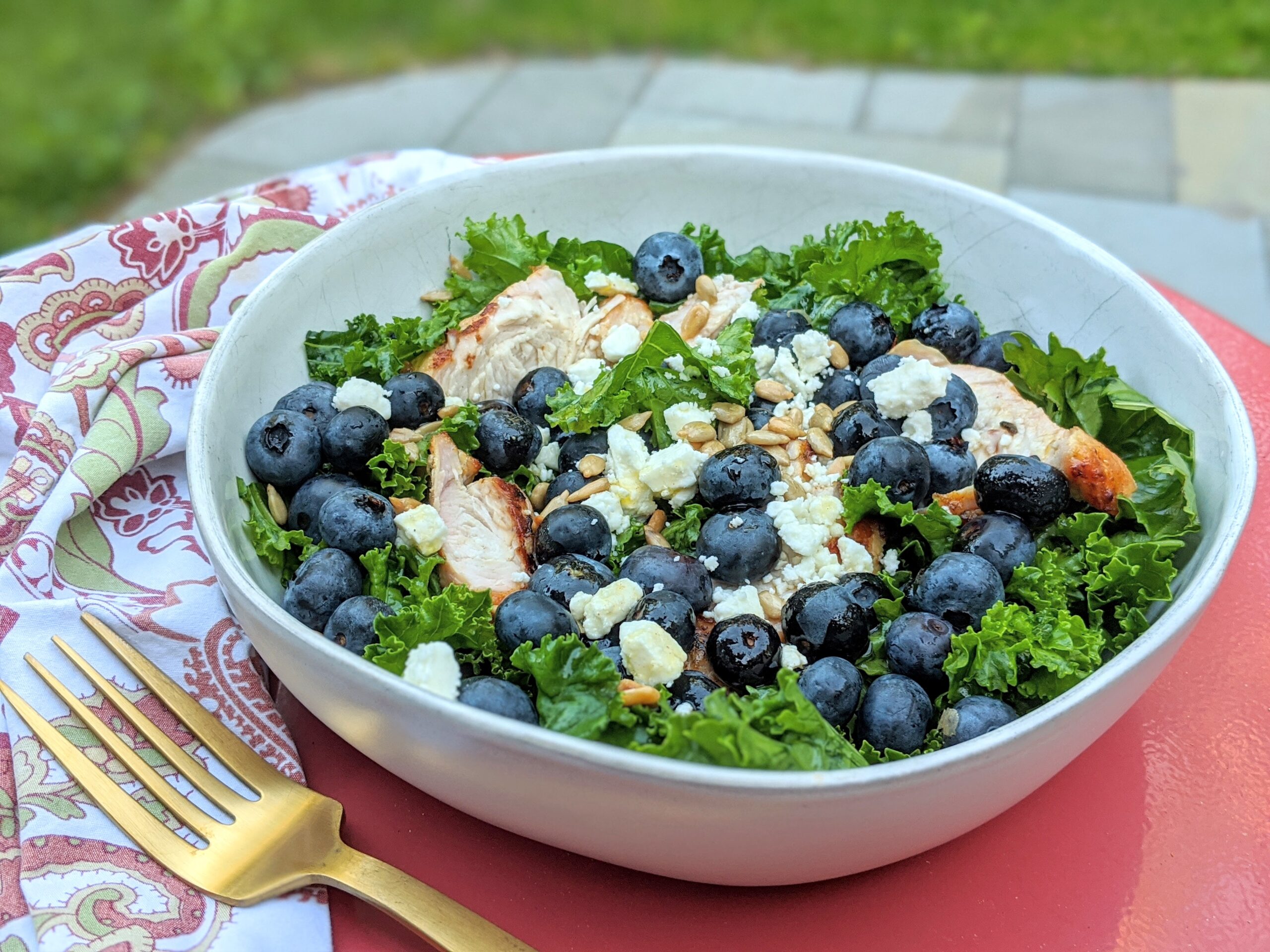 picture of kale and blueberry salad with grilled turkeky tenderloin